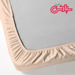 ملحفه کش دار گلبهی